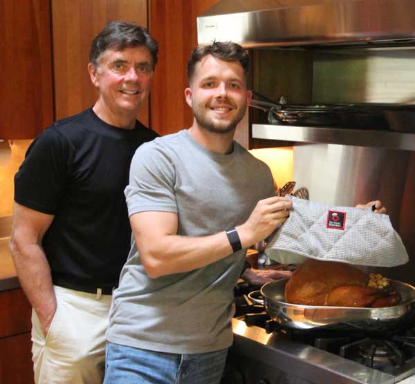 EJ and his Uncle with the Chef's Blanket